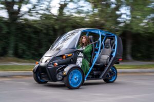 A stock image illustrating 3 wheel electric vehicle concepts