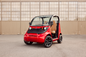 A stock image illustrating small electric car for adults concepts
