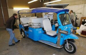 A stock image illustrating tuk tuk car concepts