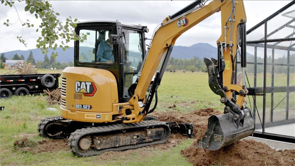cat 303 excavator truck