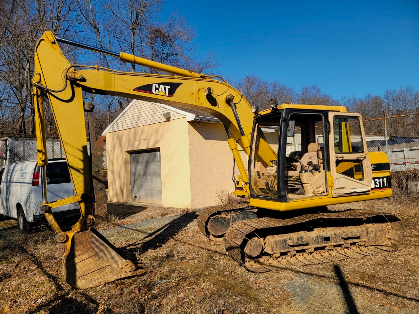 cat 311 excavator truck